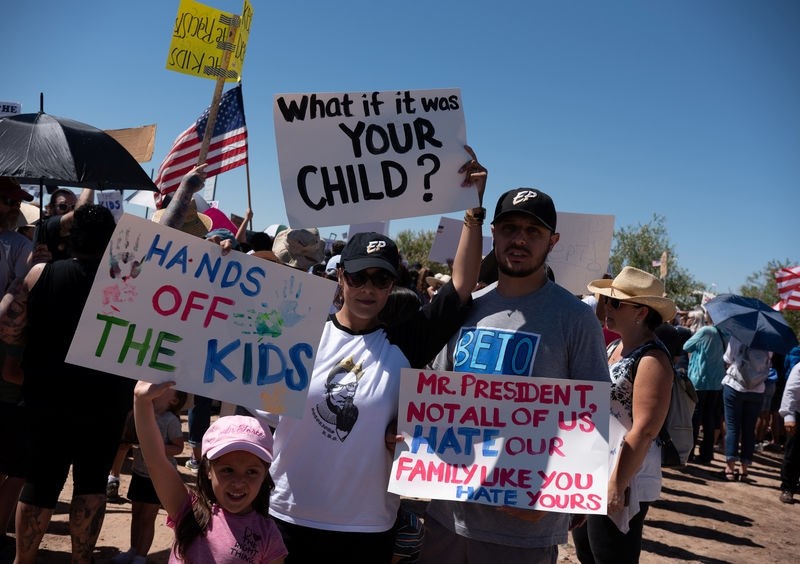 People participate in a protest against a recent U.S. immigration policy of separating children from their families when they enter the United States as undocumented immigrants, outside the Tornillo Tranist Center, in Tornillo. (Reuters Photo)
