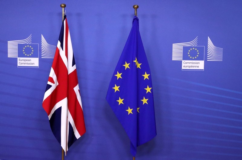 Flags of the UK and the EU are seen before UK's Prime Minister Theresa May meets with European Commission President Jean-Claude Juncker to discuss draft agreements on Brexit, at the EC headquarters in Brussels, Belgium, Nov. 21, 2018. (Reuters Photo)