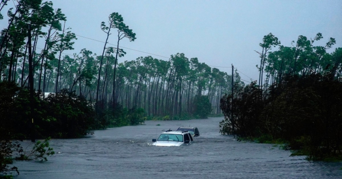 Submerged car sit submerged in water from Hurricane Dorian in Freeport, Bahamas, Tuesday, Sept. 3, 2019. (AP Photo)