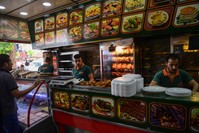 Syrian men work in a restaurant in Turkey's southeastern province of Gaziantep.