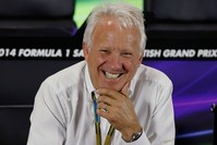 Federation Internationale de l'Automobile (FIA) race director Charlie Whiting laughs during a media question and answer session ahead of the British Grand Prix at the Silverstone race circuit, central England, July 3, 2014. (REUTERS Photo)