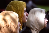 Members of the public look on during congregational Friday prayers and the two minutes of silence held for victims of the twin mosques massacre in Christchurch, March 22, 2019.