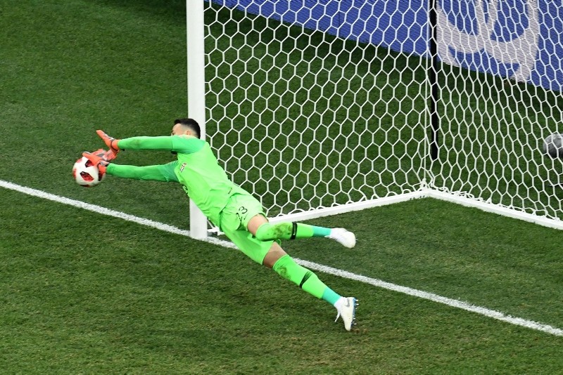 Croatia's Danijel Subasic saves a penalty from Denmark's Christian Eriksen, not pictured, during the penalty shootouts of the 2018 World Cup round of 16 match at the Nizhny Novgorod Stadium in Nizhny Novgorod, July 1, 2018. (AFP Photo)