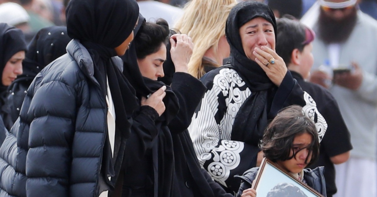 Mourners arrive for the burial service of one of the victims from the March 15 terrorist attack, at the Memorial Park Cemetery in Christchurch, March 21, 2019.