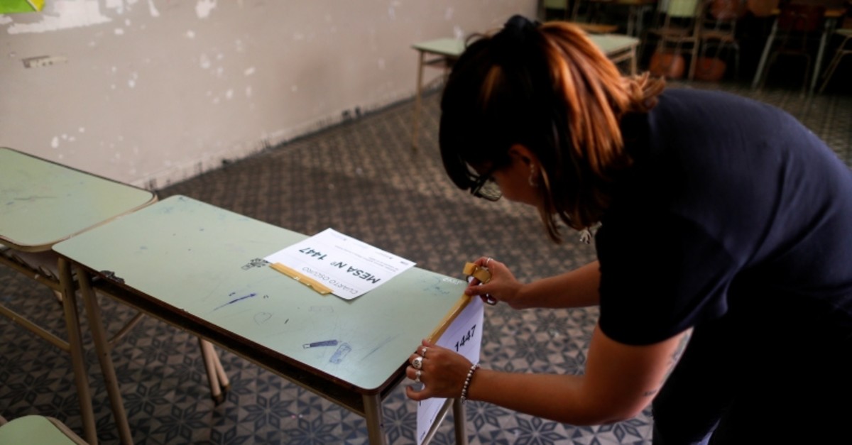 An election assistant prepares a classroom in a school, which will serve as a polling station one day ahead of presidential elections in Buenos Aires, Argentina, Oct. 26, 2019. (Reuters Photo)
