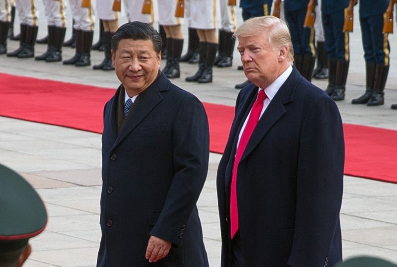 U.S. President Donald J. Trump (R) and Chinese President Xi Jinping (L) review soldiers of the Chinese People's Liberation Army honor guard during a welcome ceremony at the Great Hall of the People in Beijing, China, Nov. 09, 2017. (EPA Photo)