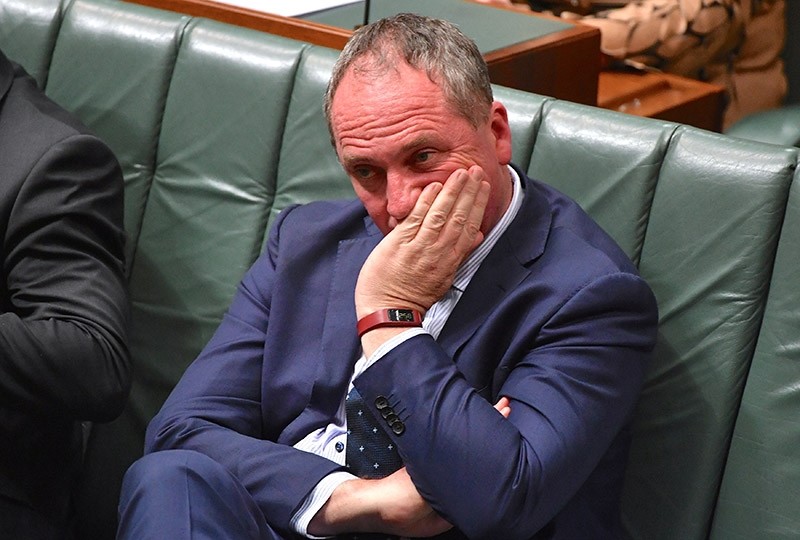 Australian Deputy Prime Minister Barnaby Joyce reacts as he sits in the House of Representatives at Parliament House in Canberra, Australia. (AAP Photo via Reuters)
