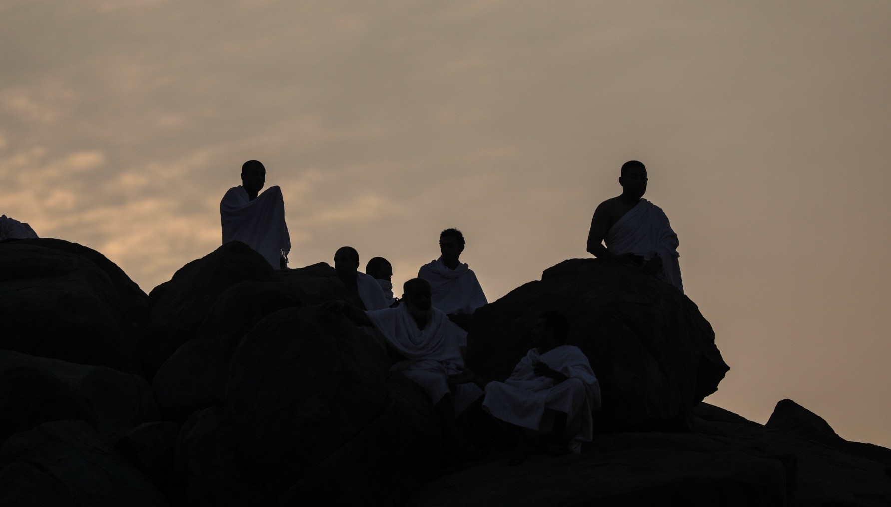 Muslim pilgrims pray during the Hajj on Mount Arafat near Mecca, a day prior to Eid al-Adha.
