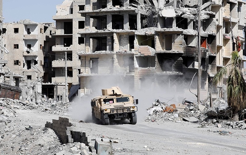 An armored vehicle of the Syrian Democratic Forces, provided by the U.S., is seen along a road in Raqqa, Syria October 8, 2017. (Reuters Photo)