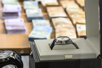 Pieces of evidence like banknotes and luxury watches are presented on Friday, May 3, 2019 at a press conference in Wiesbaden, Germany (AP Photo)
