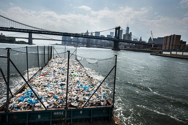 A barge with more than 300 tons of mainly plastic is on its way from the Bronx to a recycling plant in Brooklyn, New York, USA, May 26, 2016. (AP Photo)