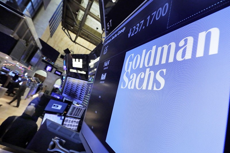 In this Tuesday, Dec. 13, 2016, file photo, the logo for Goldman Sachs appears above a trading post on the floor of the New York Stock Exchange. (AP Photo)