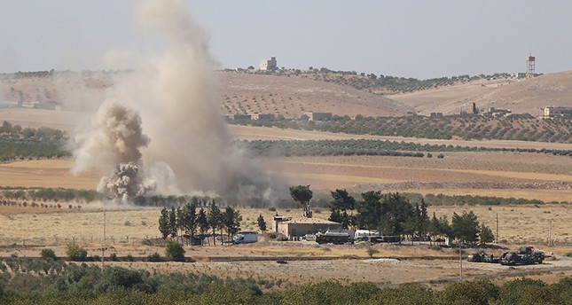 الجيش التركي يواصل تفكيك ألغام زرعها داعش وسلاح الجو يقصف مباني للتنظيم