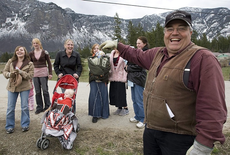 In this April 21, 2008, file photo, Winston Blackmore, the religious leader of the polygamous community of Bountiful located near Creston, British Columbia, Canada, shares a laugh with 6 of his daughters and some of his grandchildren (AP Photo)
