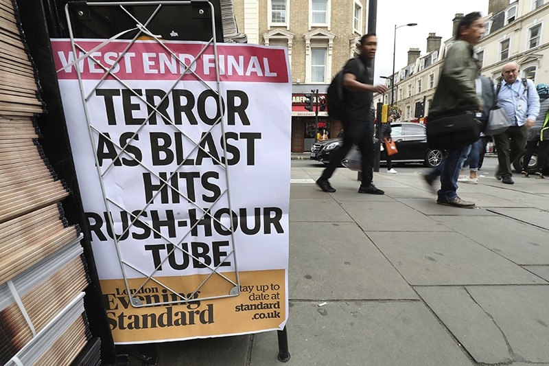 A London evening newspaper stand displays their headline outside Paddington tube station in London, after a terrorist incident was declared at Parsons Green subway station Friday, Sept. 15, 2017. (AP Photo)
