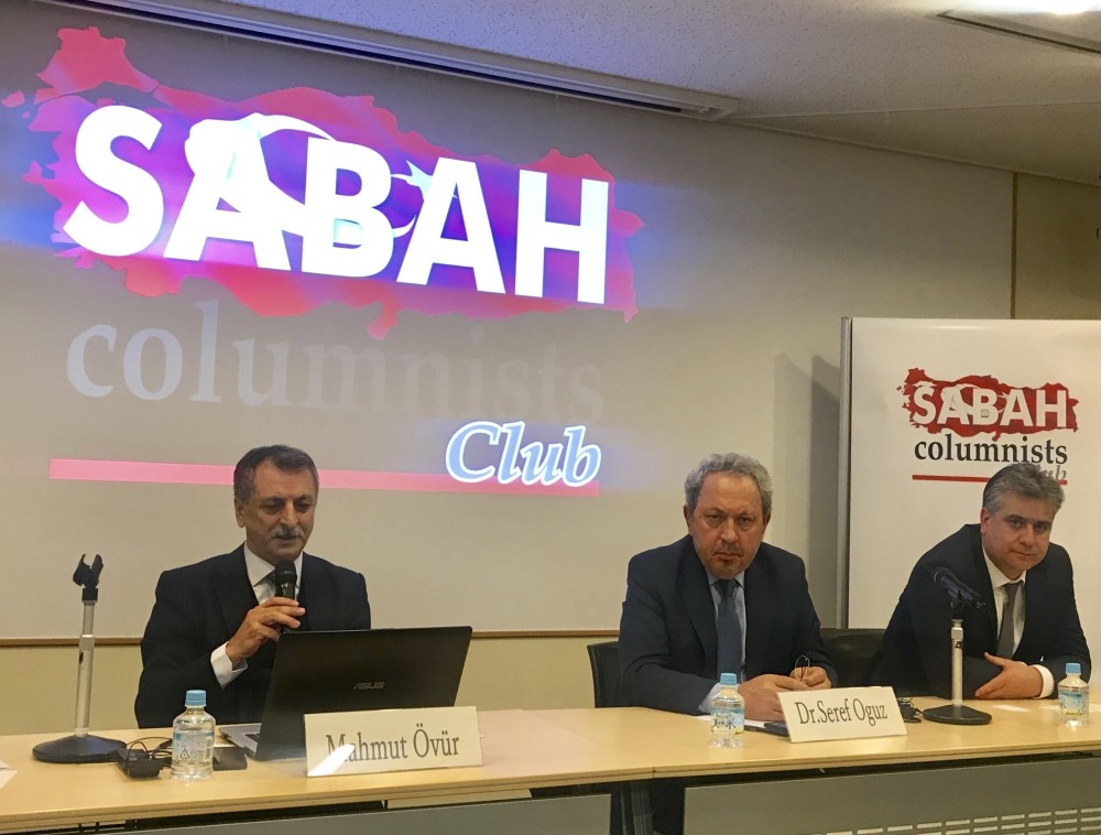 Daily Sabah columnist Mahmut u00d6vu00fcr (L) speaks at the panel.