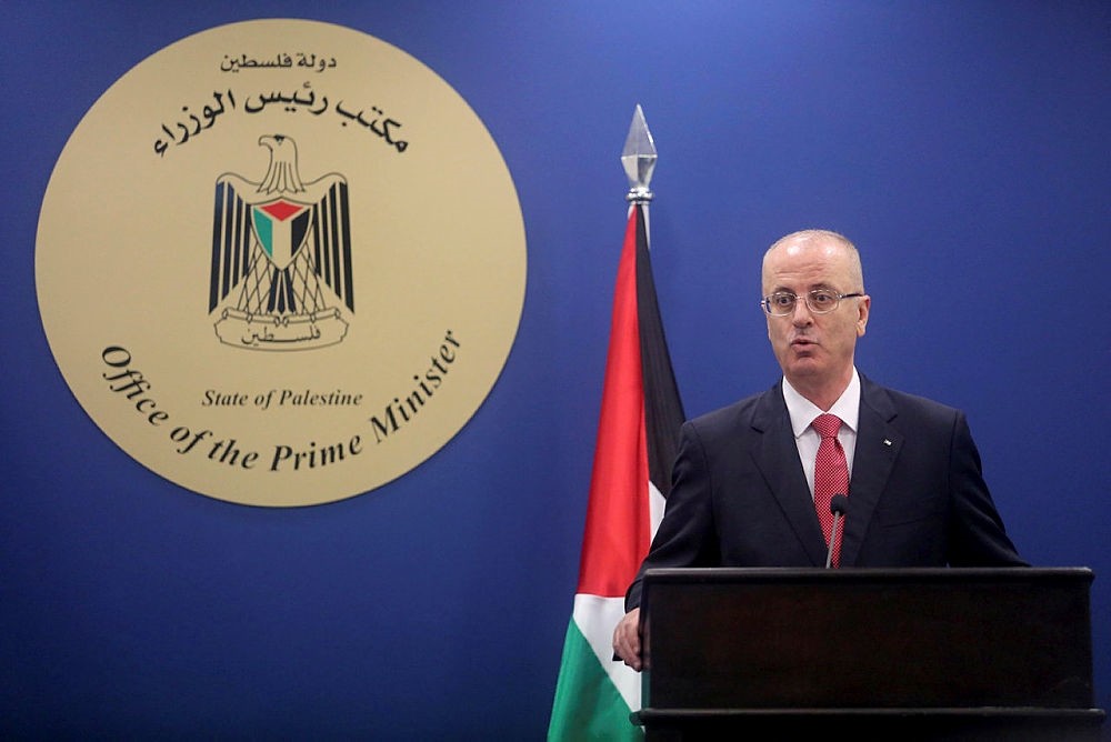Palestinian prime minister Rami Hamdallah speaks during a press conference with U.N. chief Guterres in the West Bank, Palestine. (AA Photo)