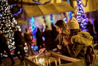 Worshippers light candles as they attend Christmas mass at Saint Antuan Church in the Beyou011flu district of Istanbul.