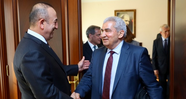 وزير الخارجية التركي يستقبل الرئيس الجديد للائتلاف السوري المعارض