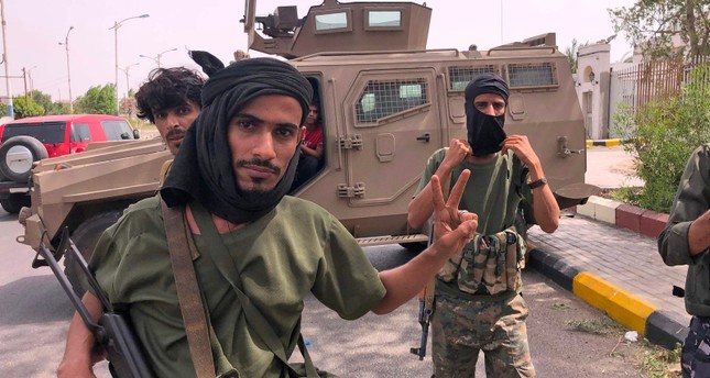 مقاتلون من قوات الحزام الأمني الموالية للإمارات في عدن