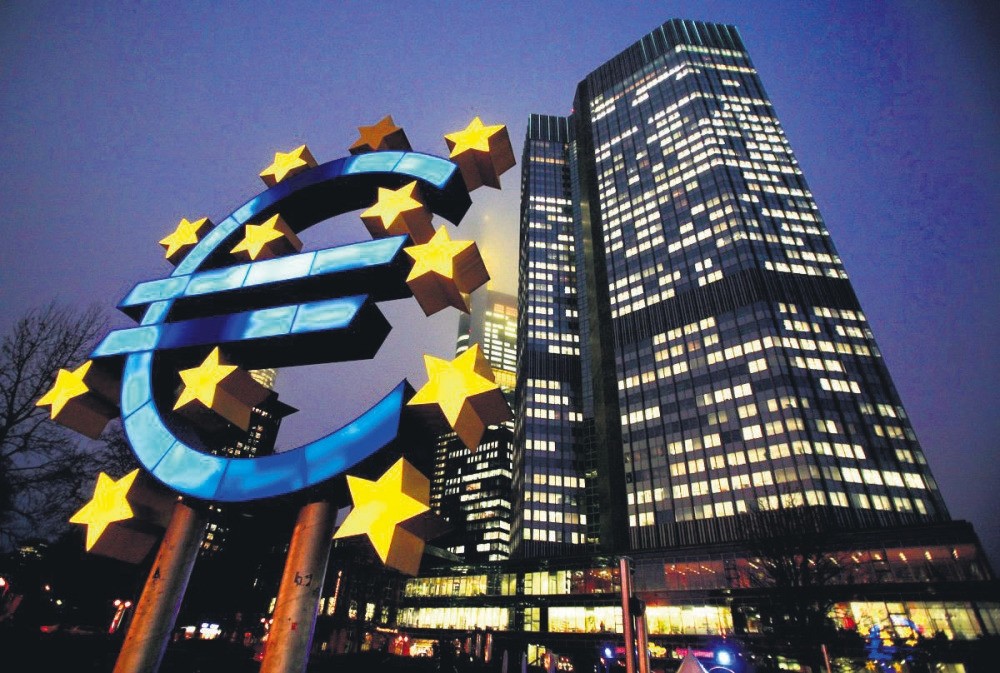 A sculpture in the shape of a euro sign seen in front of the European Central Bank headquarters in Frankfurt, Germany, Feb. 3, 2010.