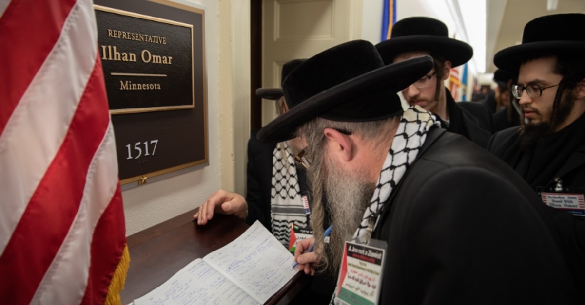 Orthodox Jews with the group Jews United Against Zionism gather outside the office of Rep. Ilhan Omar, D-Minn., in a show of support on Capitol Hill in Washington, Wednesday, March 6, 2019. (AA Photo)