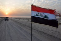 Iraqi forces drive in military vehicles in Iraq's eastern Salaheddin province south of Hawijah, Oct. 10, 2016. 