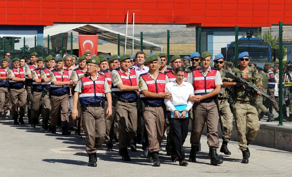 Kemal Batmaz is being brought to a courthouse in Ankara for his trial on coup charges. He was in charge of FETu00d6 infiltrators in the army's Air Forces and coordinated the coup attempt in 2016. 