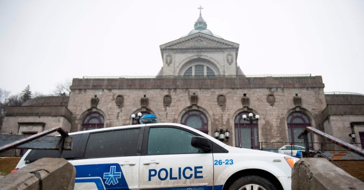 Police provide security at Saint Joseph's Oratory in Montreal on March 22, 2019, after Catholic Priest Claude Grou was stabbed during a livestreamed morning mass (AFP Photo)