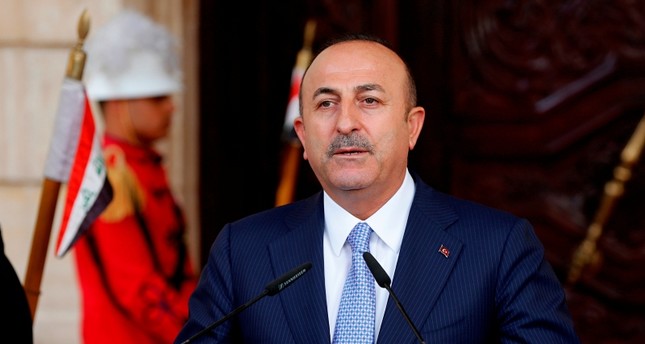 وزير الخارجية التركي يلتقي العبادي في بغداد