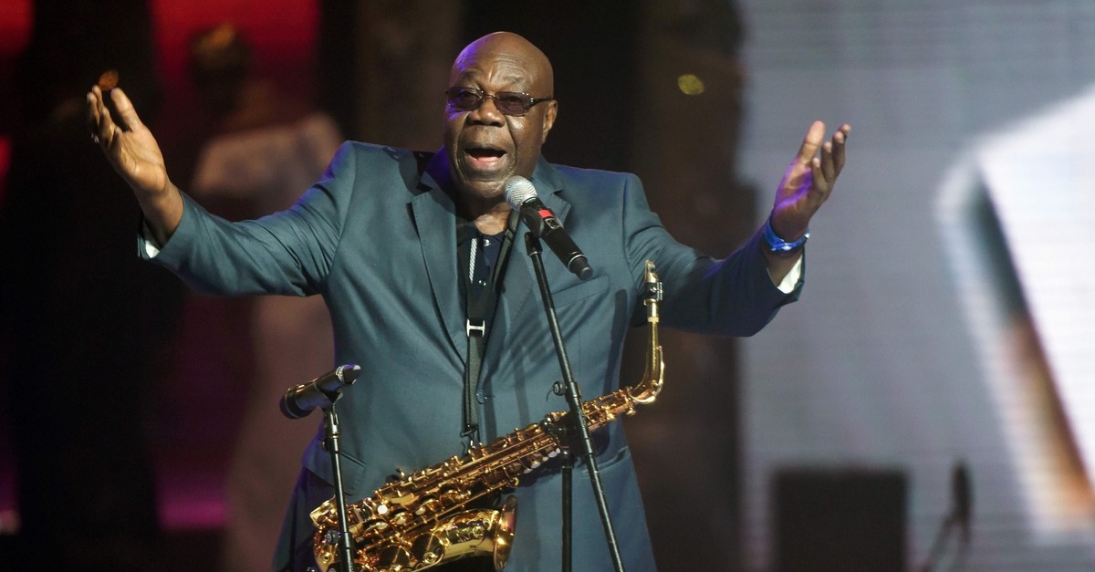 Cameroonian music legend Manu Dibango gestures as he plays during the All Africa Music Awards (AFRIMA) ceremony in Lagos in 2016.