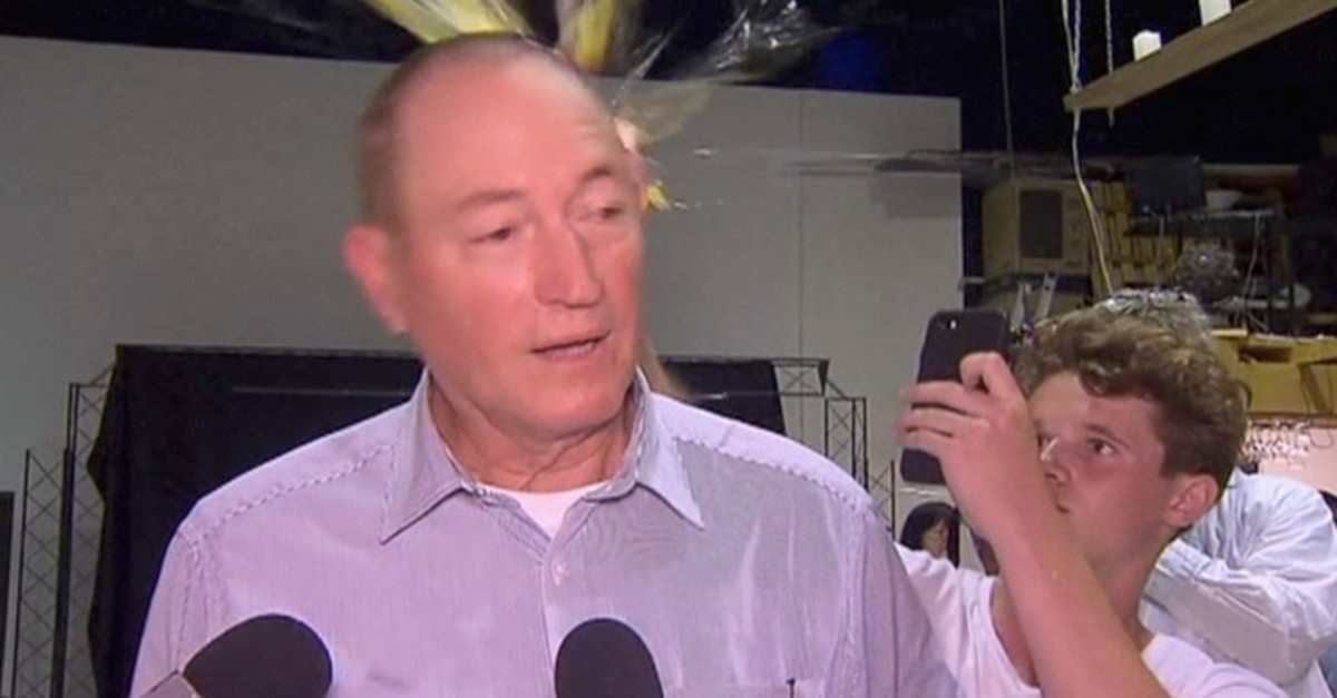  In this March 16, 2019, file image made from video, a teenager breaks an egg on the head of Senator Fraser Anning while he holds a press conference, in Melbourne (AP Photo)