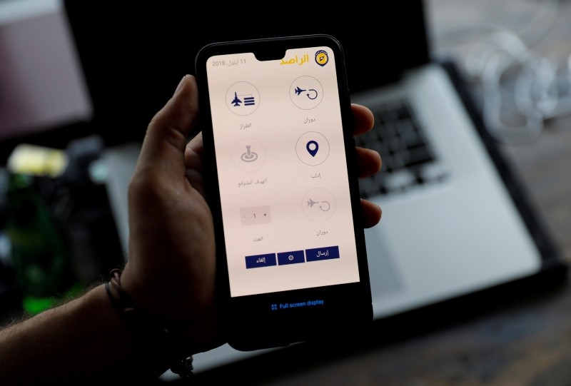 Dave Levin, one of two co-founders of Hala System, displays the mobile phone application of Sentry at his office in Turkey September 11, 2018. (Reuters Photo)