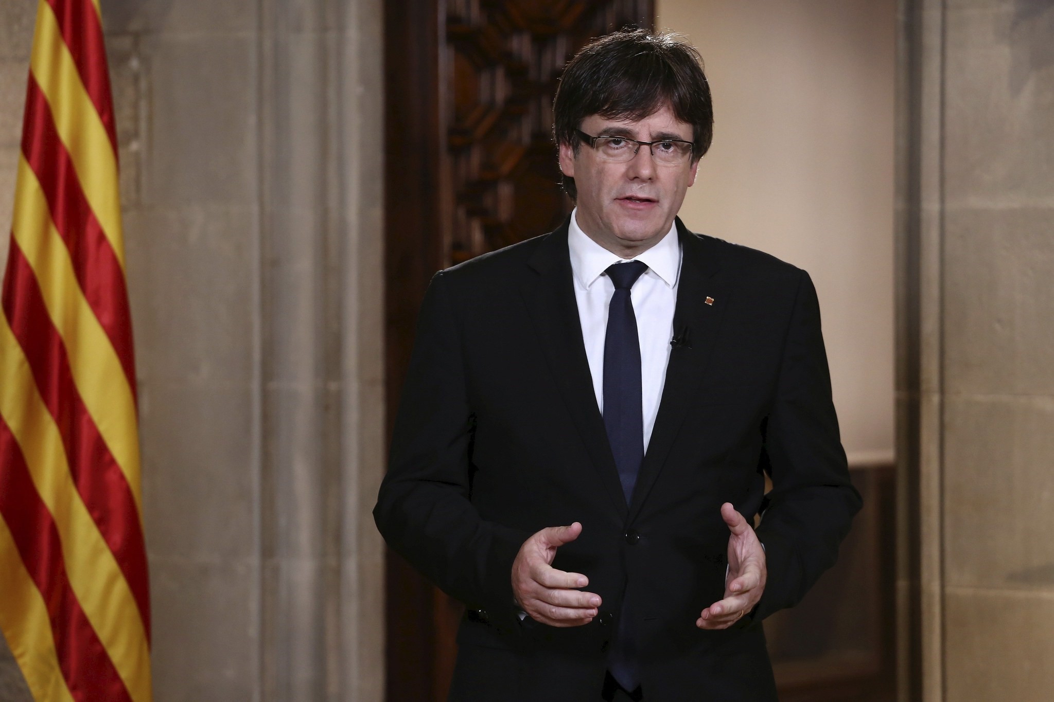 Catalonian President Carles Puigdemont giving a speech three days after the celebration of the Catalonian illegal referendum, at Palau de la Generalitat in Barcelona, Spain, Oct. 4 2017 (EPA Photo)