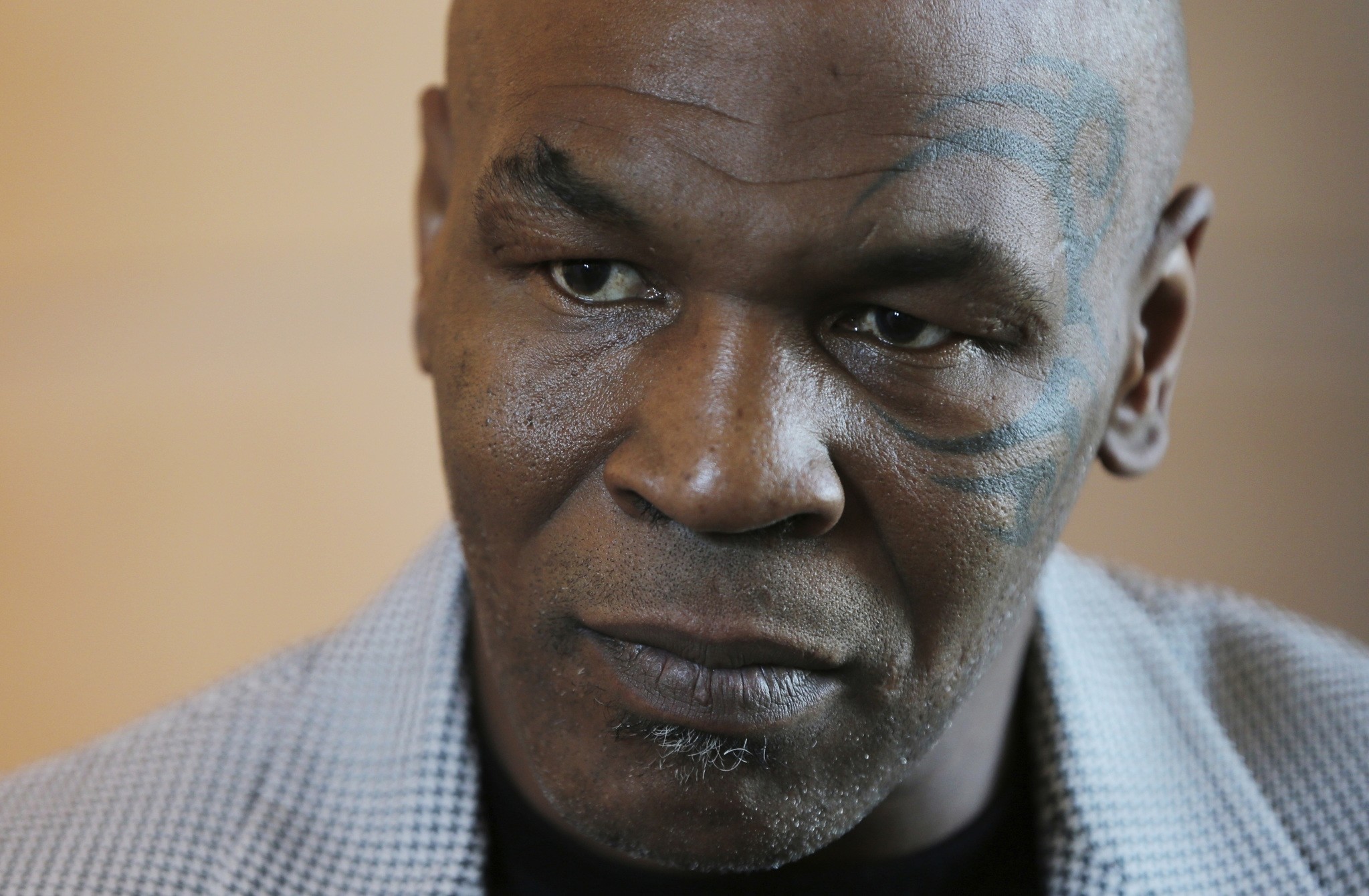 In this May 4, 2017 file photo, Mike Tyson gives an interview to The Associated Press, in Dubai, United Arab Emirates. 