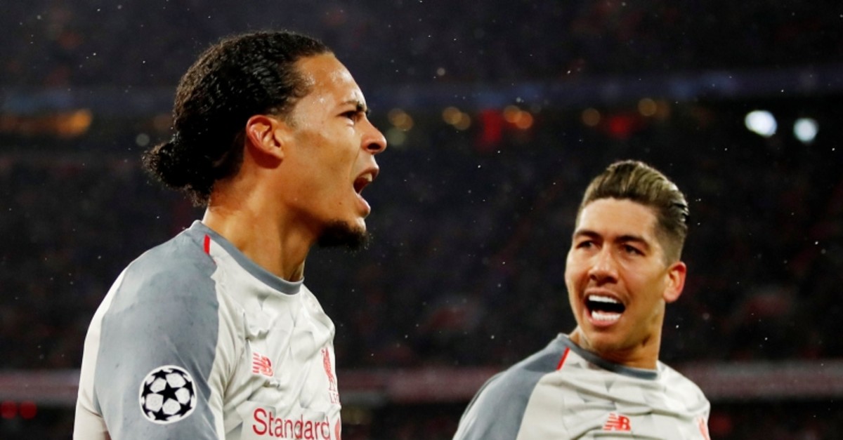 Allianz Arena, Munich, Germany - March 13, 2019  Liverpool's Virgil van Dijk celebrates scoring their second goal with Roberto Firmino (Reuters Photo)