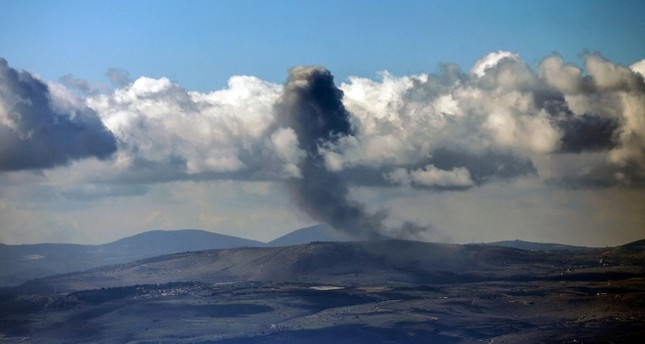 دخان يتصاعد عبر الأفق على طول التلال في جنوب لبنان بعد قصف إسرائيلي من موقع على طول الحدود في شمال إسرائيل. 14 ديسمبر 2023 الفرنسية