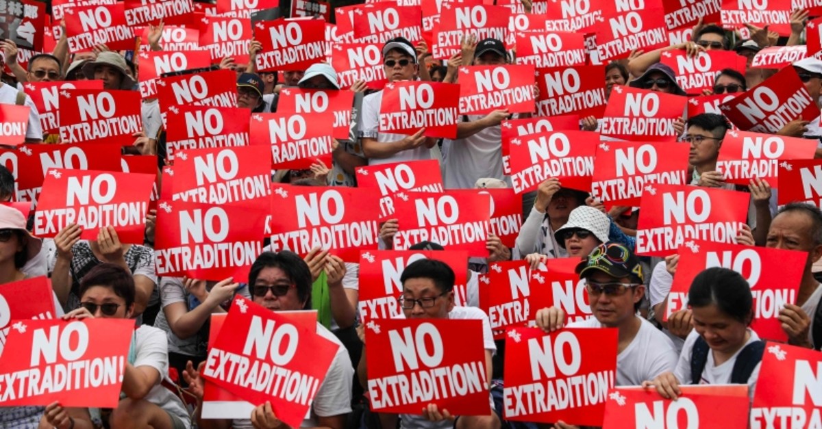 Protesters attend a rally against a controversial extradition law proposal in Hong Kong on June 9, 2019. (AFP Photo)