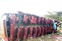 At least 50 people were killed after the bus they were travelling in overturned and its entire roof was ripped off in an accident in western Kenya, 10 Oct. 2018 (IHA Photo) 