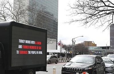 The truck drives past UN headquarters. (AA Photo)