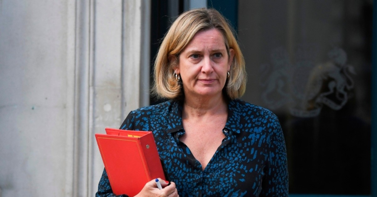 In this file photo taken on September 2, 2019 Britain's Work and Pensions Secretary and Women's minister Amber Rudd leaves the Cabinet Office on Whitehall in London (AFP Photo)
