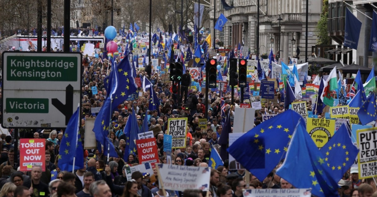 EU supporters, calling on the government to give Britons a vote on the final Brexit deal, participate in the ,People's Vote, march in central London, March 23, 2019.