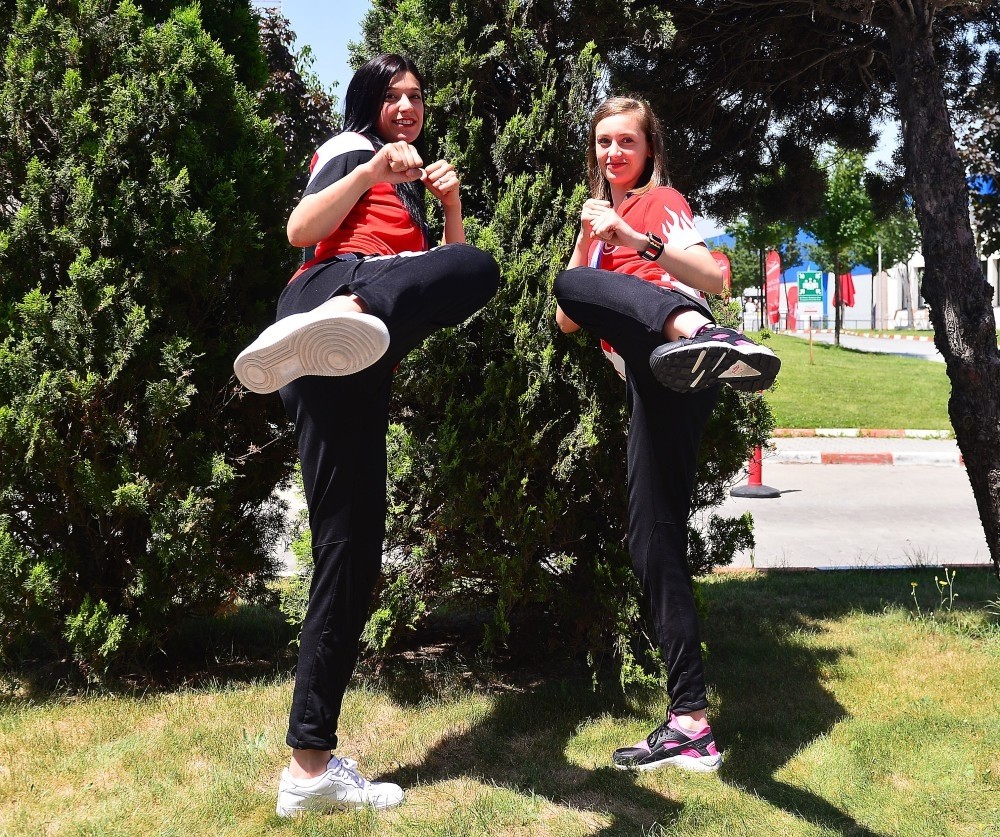 The gold medal winners at the 2017 World Taekwondo Championships, Nur Tatar Askari (L) and Zeliha Au011fru0131s pose together.
