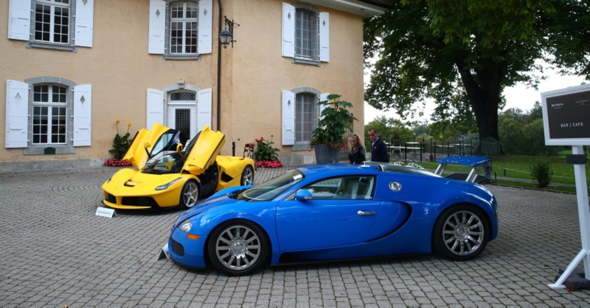 A Ferrari LaFerrari (2015) and a Bugatti Veyron EB 16.4 Coupe (2010) pictured during an auction preview of Bonhams at the Bonmont Golf & Country Club in Cheserex near Geneva, Switzerland September 27, 2019. (Reuters Photo)