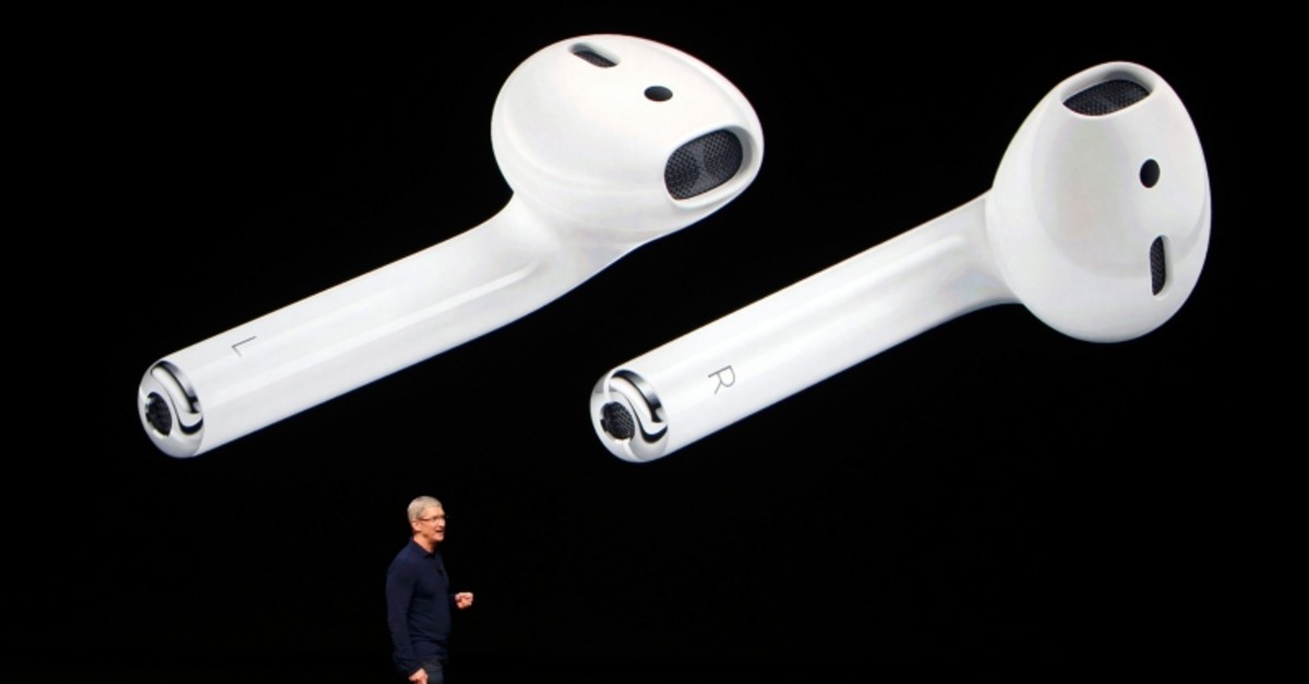 First generation AirPods are displayed as Apple CEO Tim Cook makes his closing remarks during an Apple Media event in San Francisco,Calif., Sept. 7, 2016. (Reuters Photo)