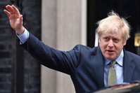 Britain's Prime Minister and Conservative Party leader Boris Johnson waves as he leaves 10 Downing Street in central London, Dec. 13, 2019. (AFP Photo)