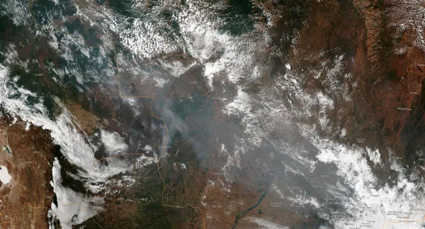 This August 21, 2019, satellite image obtained courtesy of the National Oceanic and Atmospheric Administration (NOAA) shows the smoke of several fires in the Brazilian states of Amazonas of Mato Grosso (bottom R) and Rondonia (bottom C). (AFP Photo)
