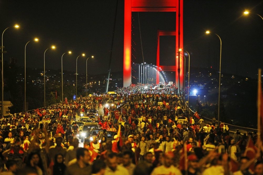 Thousands of people rally against the July 15 attempted coup on Istanbul's iconic Bosporus Bridge, which is now called the July 15 Martyrs Bridge, July 21, 2016. 