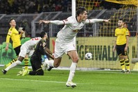 Leipzig's Schick celebrates after scoring his side's third goal during the match against Borussia Dortmund, Dec. 17, 2019. (AP Photo)