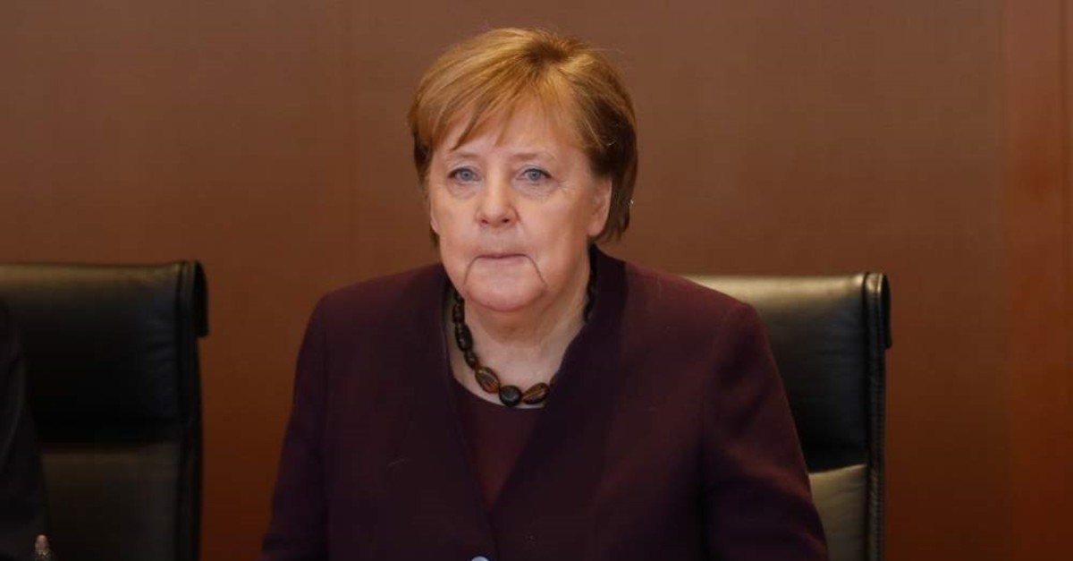 German Chancellor Angela Merkel attends the weekly cabinet meeting at the chancellery in Berlin, Germany, Wednesday, Feb. 12, 2020. (AP Photo/Markus Schreiber)